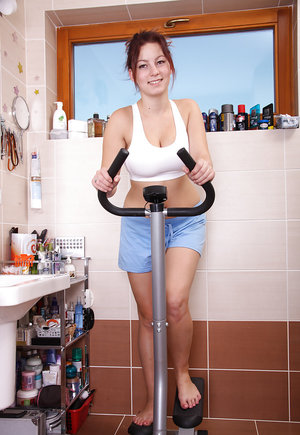 18 year old blond with big tits Aislin wets and fingers her pink slit in a tub